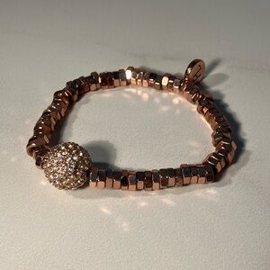 Casual stretch Naomi bracelet. Created in warm, rose gold tone.